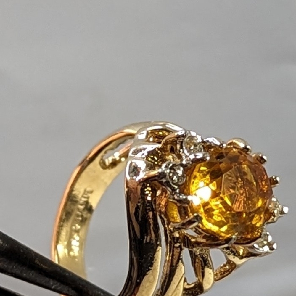 Radiant Gold Ring with Yellow Gemstone